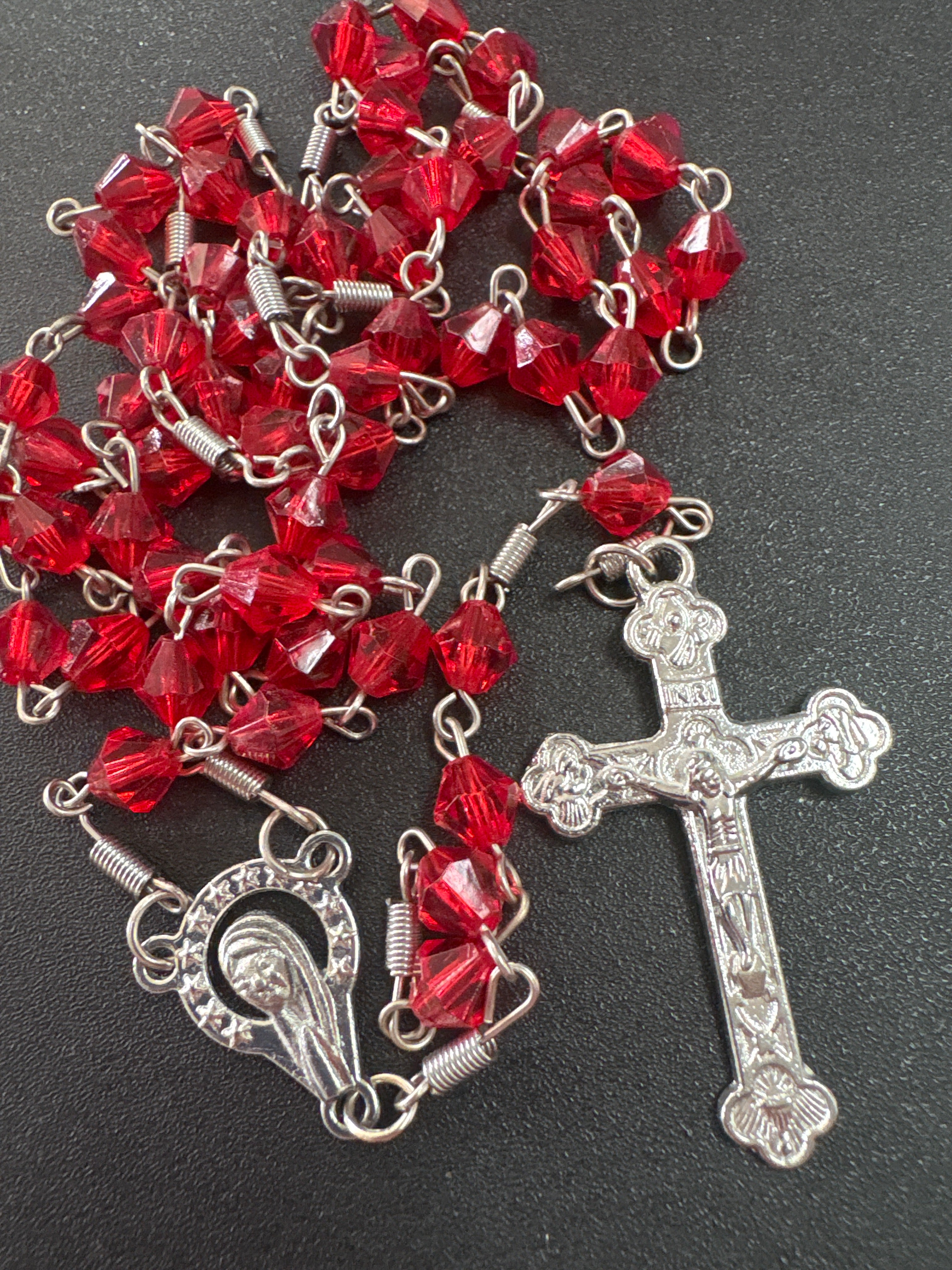 Red Rosary with Mary centerpiece